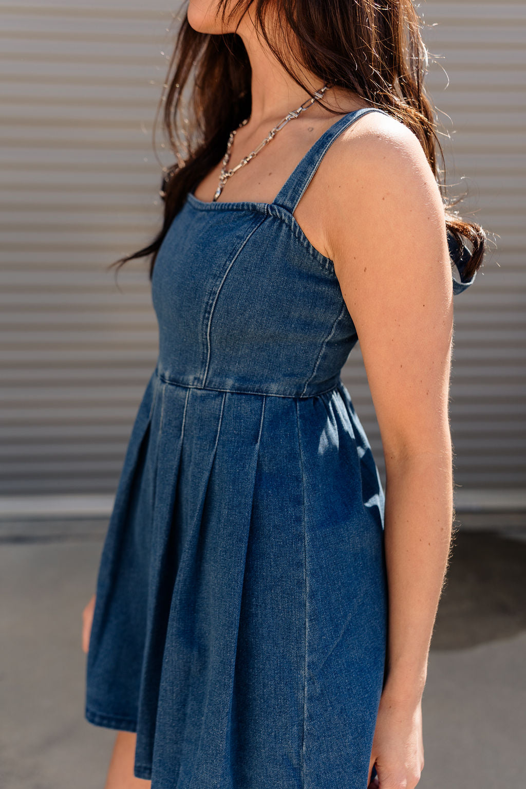 Sonya Dark Denim Pleated Skirt Mini Dress- close up side view