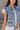Trinity Light Denim Ruffle Vest- close up frontal side view