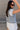 Trinity Light Denim Ruffle Vest- back side view