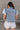 Trinity Light Denim Ruffle Vest- back view