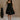 Full body view of female model wearing the Abigail Strapless Flare Mini Dress in black which features features Mini Length, Lining, Two Side Pockets, Strapless and Monochrome Back Zipper with Hook Closure.