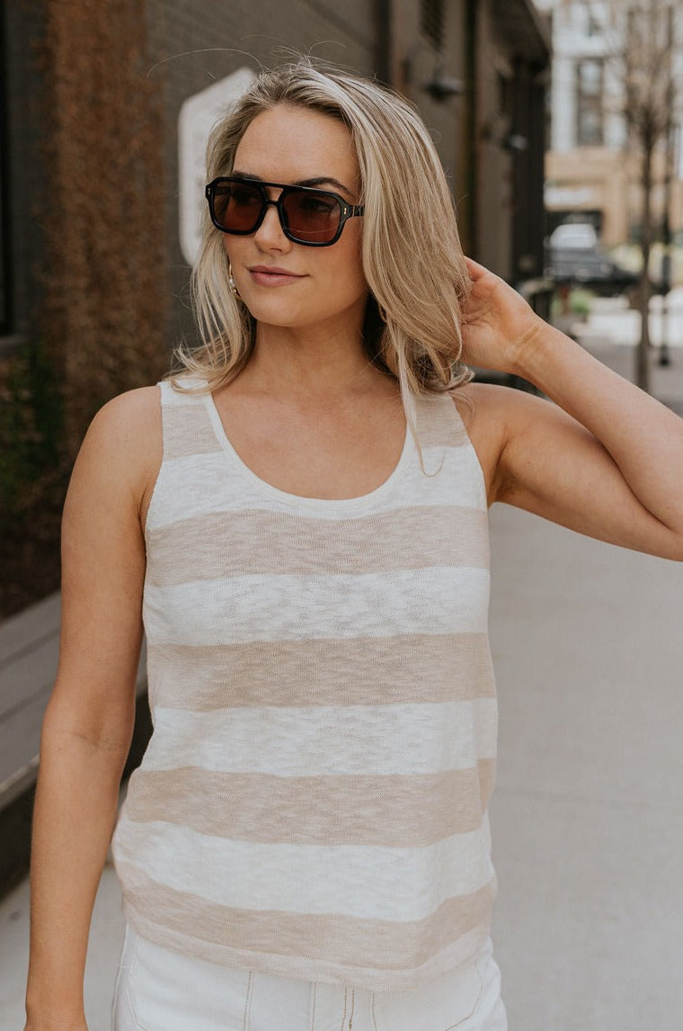 Front view of female model wearing the Esme Taupe & Cream Stripe Tank which features Taupe & Cream Stripe Knit Fabric, Scoop Neckline and Sleeveless