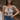 Front view of female model wearing the Elaina Black & Cream Floral Tank which features Black and Cream Floral Smocked Fabric, Cropped Waist, Lettuce Hem Details, Square Neckline and Thick Straps