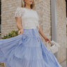 Full body view of female model wearing the Alana Periwinkle Tiered Maxi Skirt  which features Periwinkle Lightweight Fabric, Maxi Length, Periwinkle Thigh Length Lining, Tiered Body and Elastic Waistband with Drawstring Ties