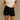 Front view of female model wearing the Ava Washed Black Denim Shorts which features Washed Black Denim Fabric, Two Front Pockets, Two Back Pockets, Silver Button with Zipper Closure and Belt Loops