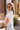 Aria White Eyelet Front Ties Top - side view on blonde model