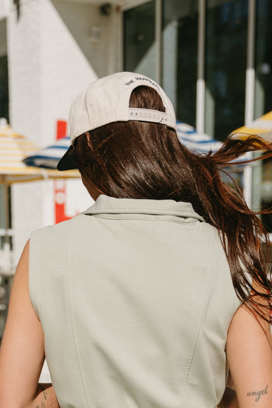 The Happiest Join The Club Trucker Hat - back view on model