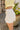 Lainey Cream Frayed Mini Skort- close up side view