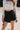 Lainey Black Frayed Mini Skort- close up front view