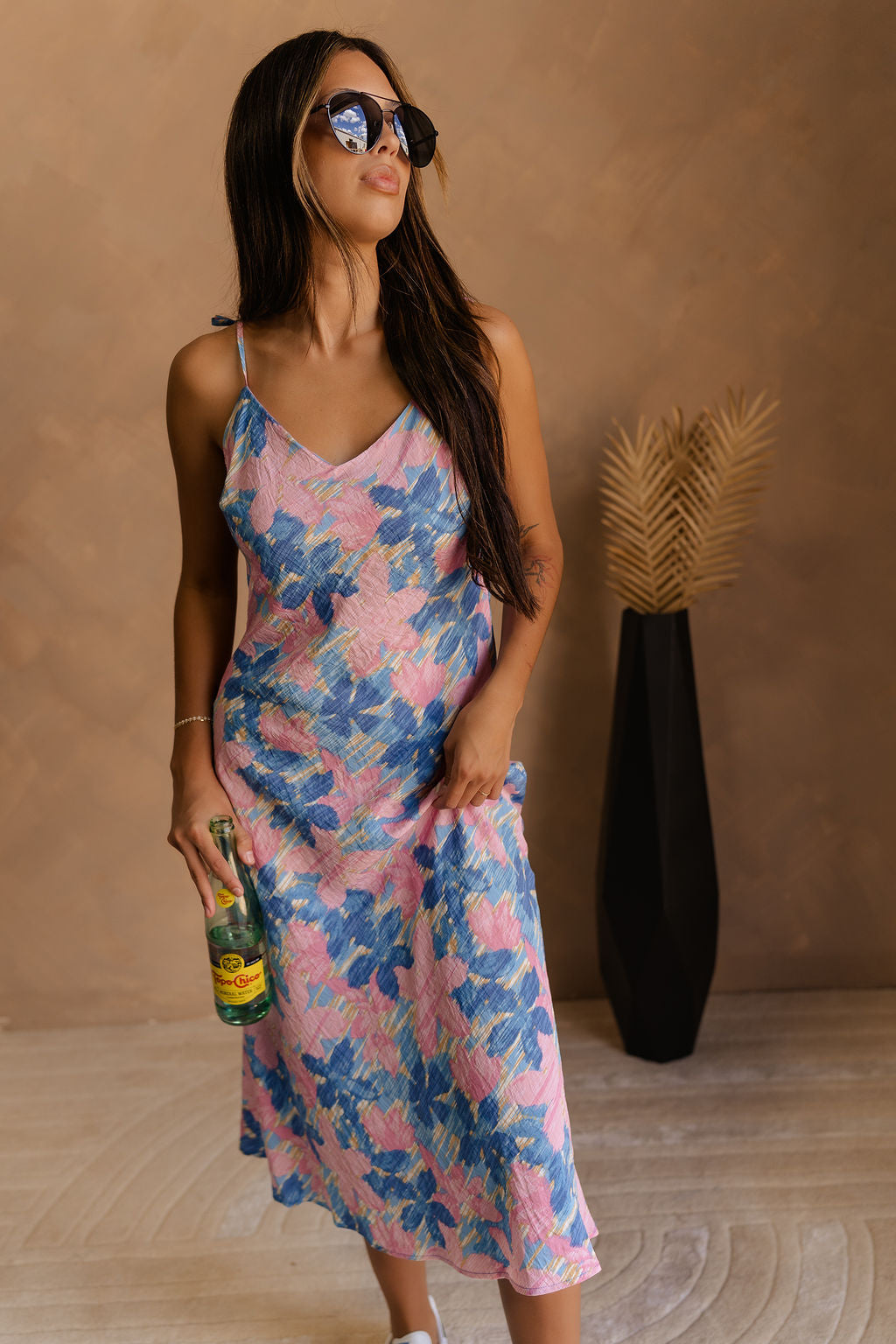Front view of female model wearing the Madison Blue and Rose Pink Midi Dress which features Blue and Pink Floral Design, Midi Length, Sweetheart Neckline and Adjustable Straps.