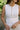Selah White Ribbed Quarter Button-Up Tank- close up front view