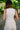 Selah White Ribbed Quarter Button-Up Tank- close up back view