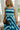 front view of the Wren Navy And Green Stripe Midi Dress