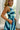 side view of the Wren Navy And Green Stripe Midi Dress