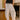 front view of the Briar Cream & Black Stripe Barrel Leg Pants