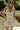 front view of the Juliet Natural Flare Halter Mini Dress