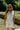 front view of the The Georgia Mae White Button-Up Romper 