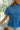 Sloane Blue Pleated Waist Short Sleeve Top- close up side view