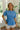 Sloane Blue Pleated Waist Short Sleeve Top- close up front view