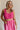Front view of female model wearing the Cecilia Pink Smocked Midi Dress which features Pink Lightweight Fabric, Pink Lining, Pockets On Each Side, Midi Length, Textured Upper, Square Neckline and Sleeveless