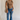Full body view of female model wearing the Emerson Medium Wash Straight Leg Jeans which features Medium Wash Denim, Two Front Pockets, Two Back Pockets, Front Zipper with Button Closure, Belt Loops and Straight Pant Legs