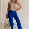 Full body view of female model wearing the Freya Cobalt Blue Straight Leg Pants which features Cobalt Blue Cotton Fabric, Wide Pant Legs, Elastic Waistband and Two Side Pockets