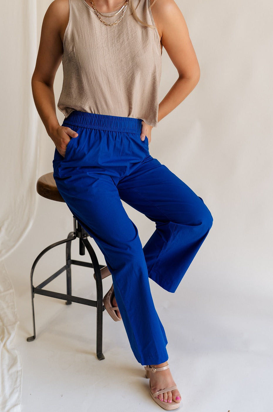 Front view of female model wearing the Freya Cobalt Blue Straight Leg Pants which features Cobalt Blue Cotton Fabric, Wide Pant Legs, Elastic Waistband and Two Side Pockets