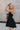Celeste Black Corset Strapless Mini Flare Dress- frontal side view