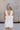 Madilyn White Back Bow Romper- back view