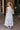Valeria Cream & Blue Floral Midi Skirt- full body back view