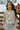 Front view of female model wearing the Clara Natural Crochet Medallion Tank which features Natural Open Knit Fabric, Medallion Pattern Design, Round Neckline and Sleeveless