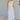 Front view of female model wearing the Alayna White Linen Sleeveless Maxi Dress which features White Linen Fabric, Fray Hem Details, Quarter Button-Up, Collared Neckline and Sleeveless