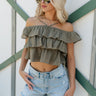 Front view of female model wearing the Kamila Olive Ruffle Off-The-Shoulder Top which features Olive Green Cotton Fabric, Ruffle Tiered Body, Adjustable Straps and Cropped Waist