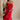 Full body view of female model wearing the Sarah Red Ruffle Hem Midi Dress which features Red Lightweight Fabric, Flare Hem Skirt, Midi Length, Red Lining, Ruched Upper, Strapless and Smocked Back