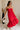 Full body view of female model wearing the Sarah Red Ruffle Hem Midi Dress which features Red Lightweight Fabric, Flare Hem Skirt, Midi Length, Red Lining, Ruched Upper, Strapless and Smocked Back