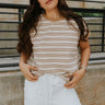 Front view of female model wearing the Celeste Taupe & White Stripe Short Sleeve Top which features Taupe and Cream Lightweight Fabric, Thin Stripe Pattern, Round Neckline and Short Sleeves
