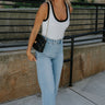 Full body view of female model wearing the Laila Off White & Black Trim Tank which features Off White Ribbed Tank, Black Trim Details,  Round Neckline and Sleeveless