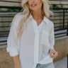 Front view of female model wearing the Madison Button Up Stripe Blouse which features Stripe Pattern, Lightweight Fabric, Front Button Up Closure, Left Front Chest Pocket, Collared Neckline, Long Sleeves with Buttoned Cuffs.