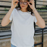 front view of female model wearing the Harley Cotton Short Sleeve Top which features Cotton Fabric, Round Neckline and Short Sleeves. the top is available in lavender, off white and mint green