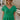 front view of female model wearing the Leia Green Knit Ruffle Short Sleeve Top which features Kelly Green Knit Fabric, Ruffle Details, Scalloped V-Neckline and Short Sleeves with Ruffle Layer Hem