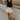 Full body view of female model wearing the Lianna Black Sleeveless Tank which features Black Lightweight Fabric, Black Lining, Round Neckline and Sleeveless