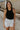 front view of female model wearing the Lianna Black Sleeveless Tank which features Black Lightweight Fabric, Black Lining, Round Neckline and Sleeveless