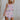 front view of female model wearing the Skye Pink Multi Floral Tank which features Pink, Purple and Peach Floral Print, Cropped Waist, Square Neckline, Back Cut-Out Design and Sleeveless