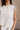 Everly Beige & Black Ruffle Sleeveless Top- frontal side view