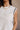 Everly Beige & Black Ruffle Sleeveless Top- close up top view