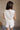 Everly Beige & Black Ruffle Sleeveless Top- back view