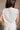 Everly Beige & Black Ruffle Sleeveless Top- close up back view