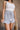 Daniela White & Blue Stripe Sleeveless Romper- close up side view