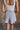 Daniela White & Blue Stripe Sleeveless Romper- close up back view