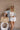 Demi Natural Straw & Cognac Shoulder Purse - front view on model's wrist